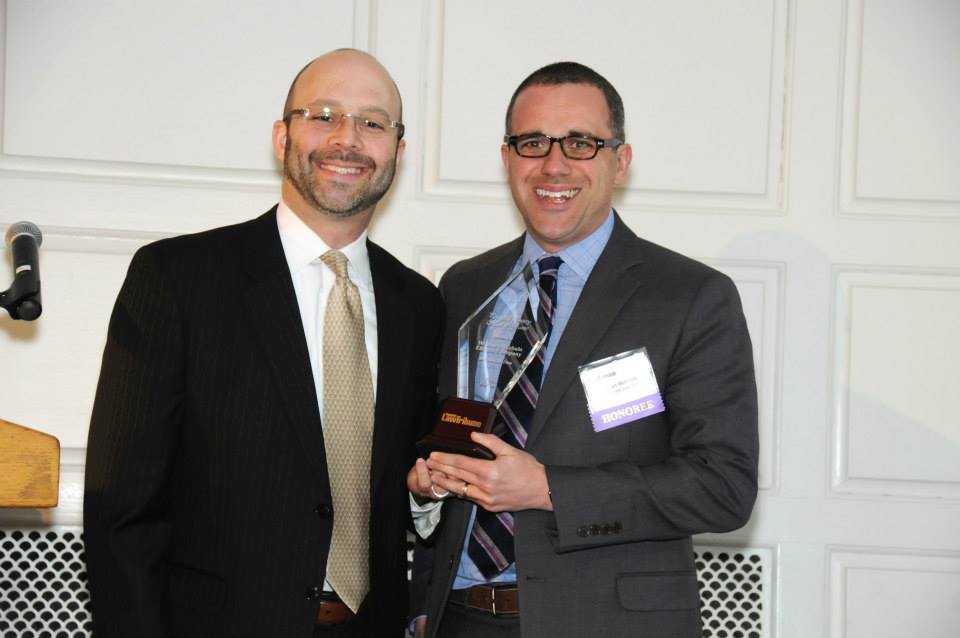 Connecticut Personal Injury Attorney Ryan McKeen getting an award from the CT Personal Injury Hall of Fame.